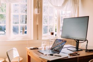 Laptop and monitor set up in home working space
