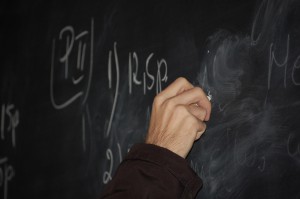 Teacher-writing-on-blackboard564
